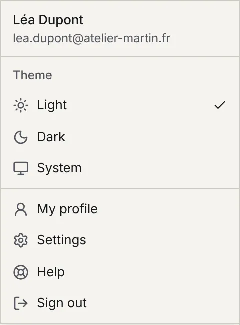 The user menu: name and e-mail, the Light, Dark or System theme choice, then My profile, Settings, Help and Sign out.