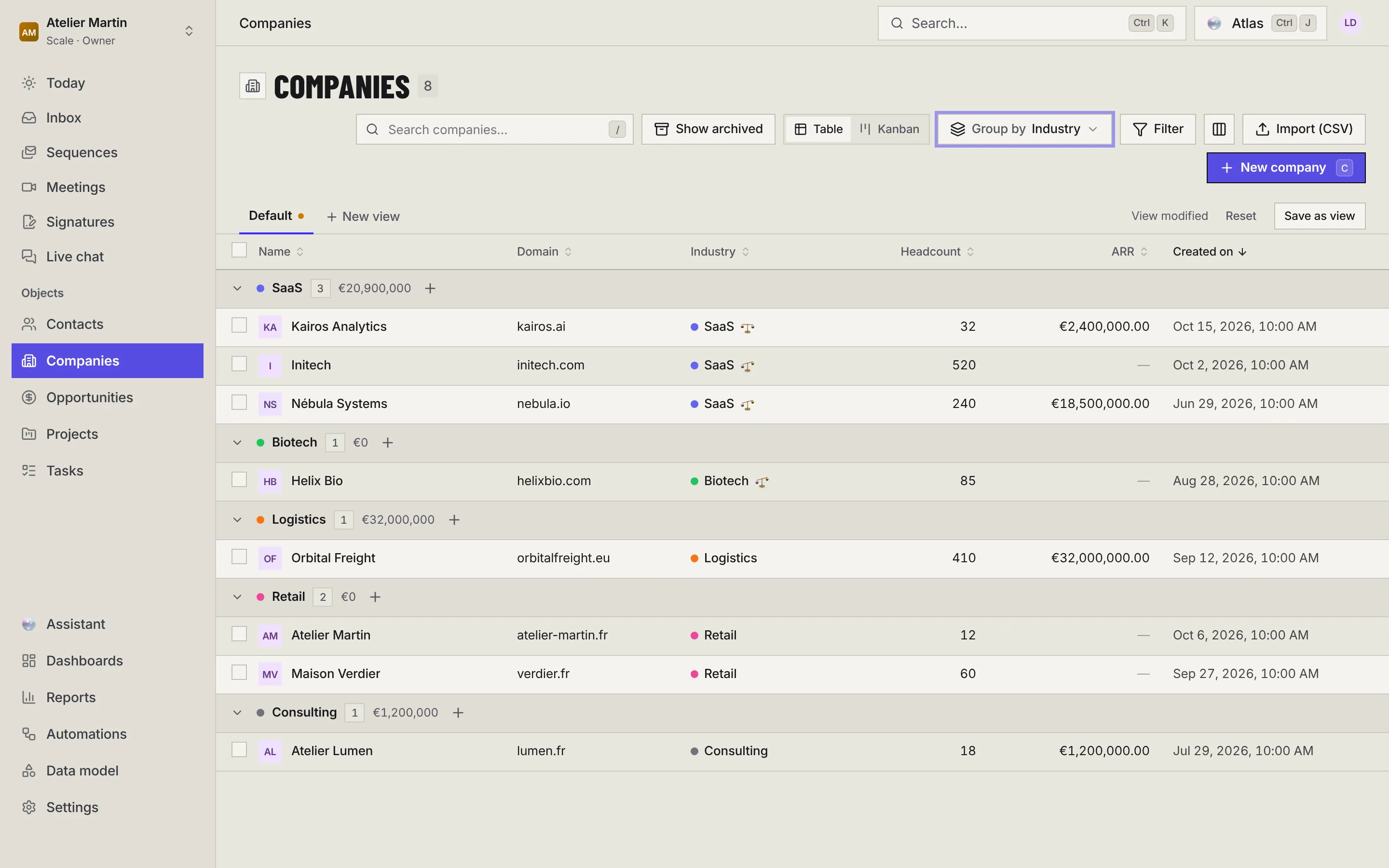 The companies list grouped by industry: SaaS, Biotech, Logistics, Retail and Consulting, each group with its record count and total ARR, and the view bar with View modified and Save as view.