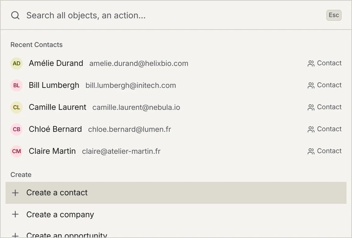 The command palette open: recent contacts, then the Create a contact, Create a company and Create an opportunity actions.
